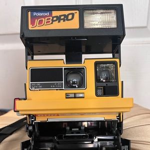 Classic Polaroid Pro instant camera. Great for collectors & photo enthusiasts.